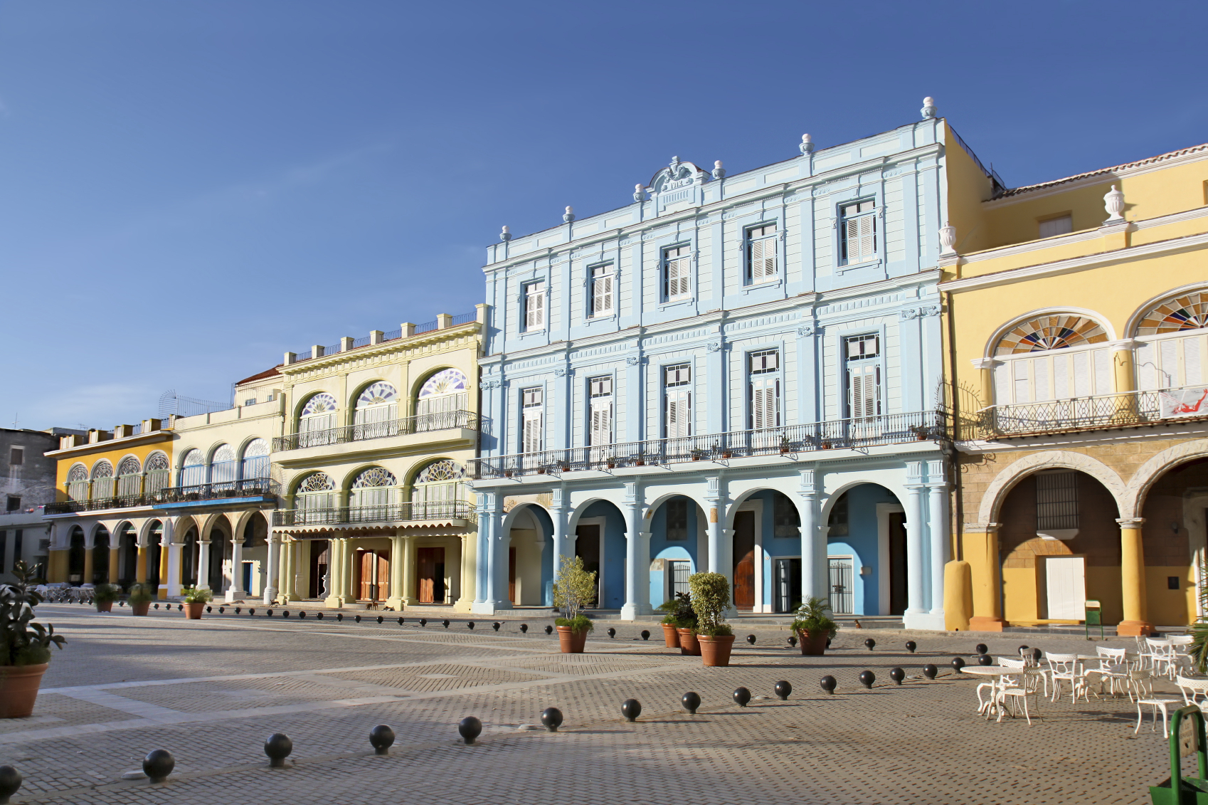 Detail of Old Havana plaza Vieja with colorful tropical buildings, Cuba.